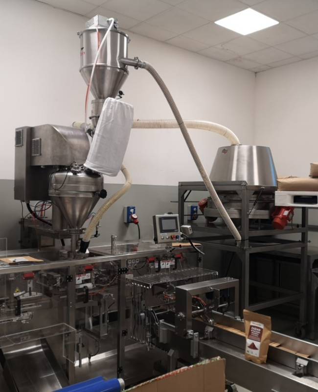 Sweets packaging line feeding with Delfin pneumatic conveyor