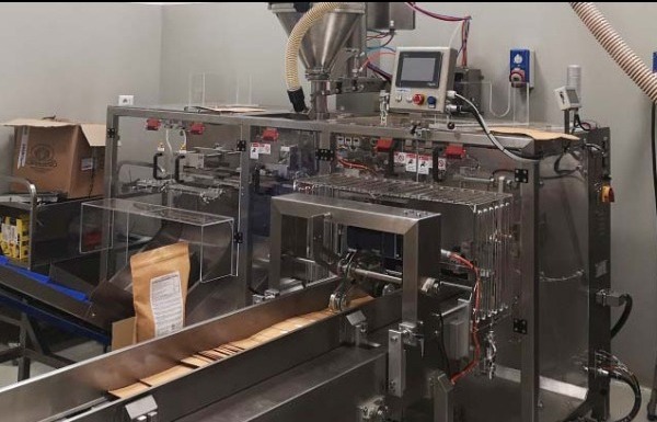 Sweets packaging line feeding with pneumatic conveyor
